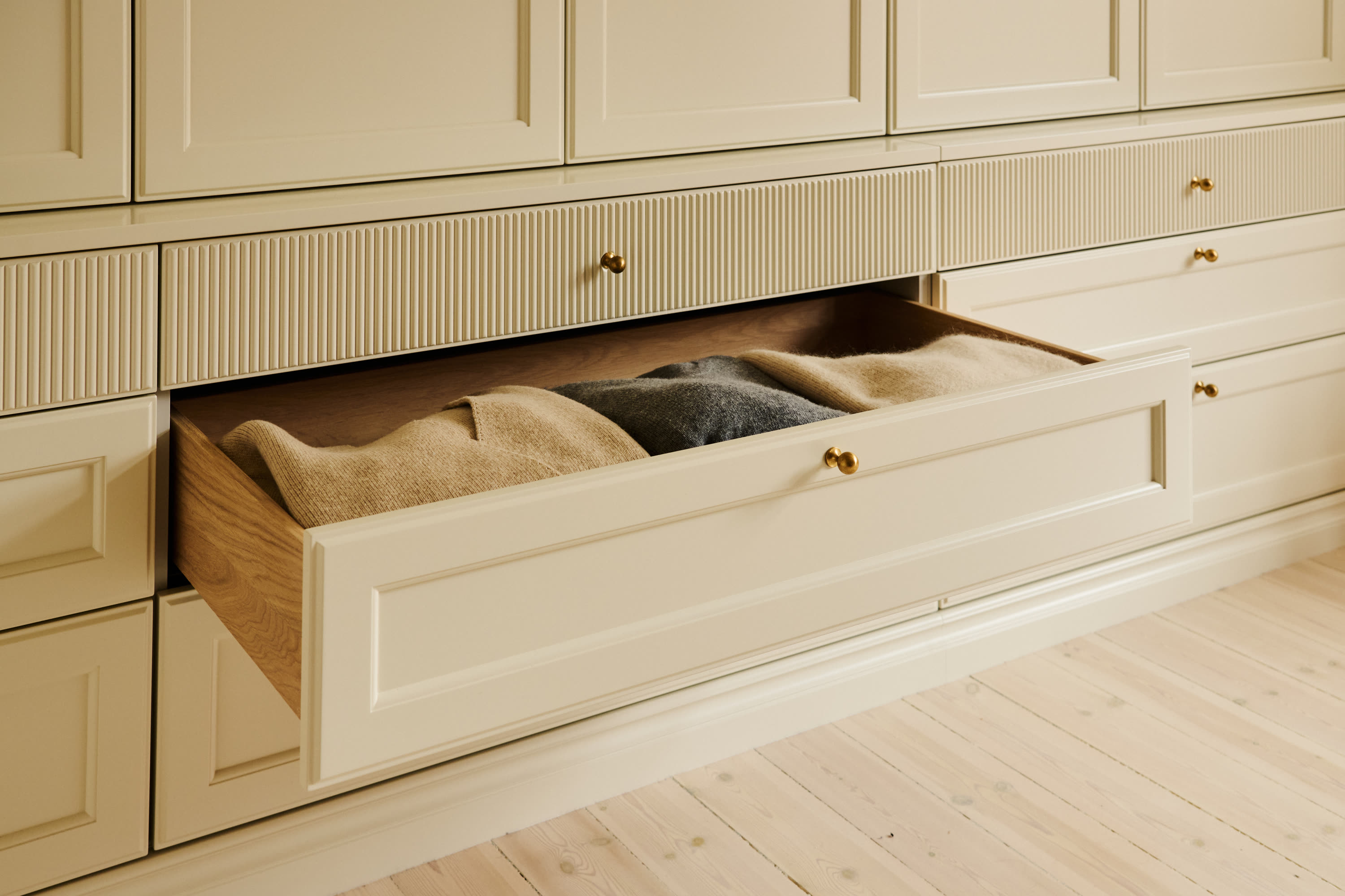 A wide drawer with blankets