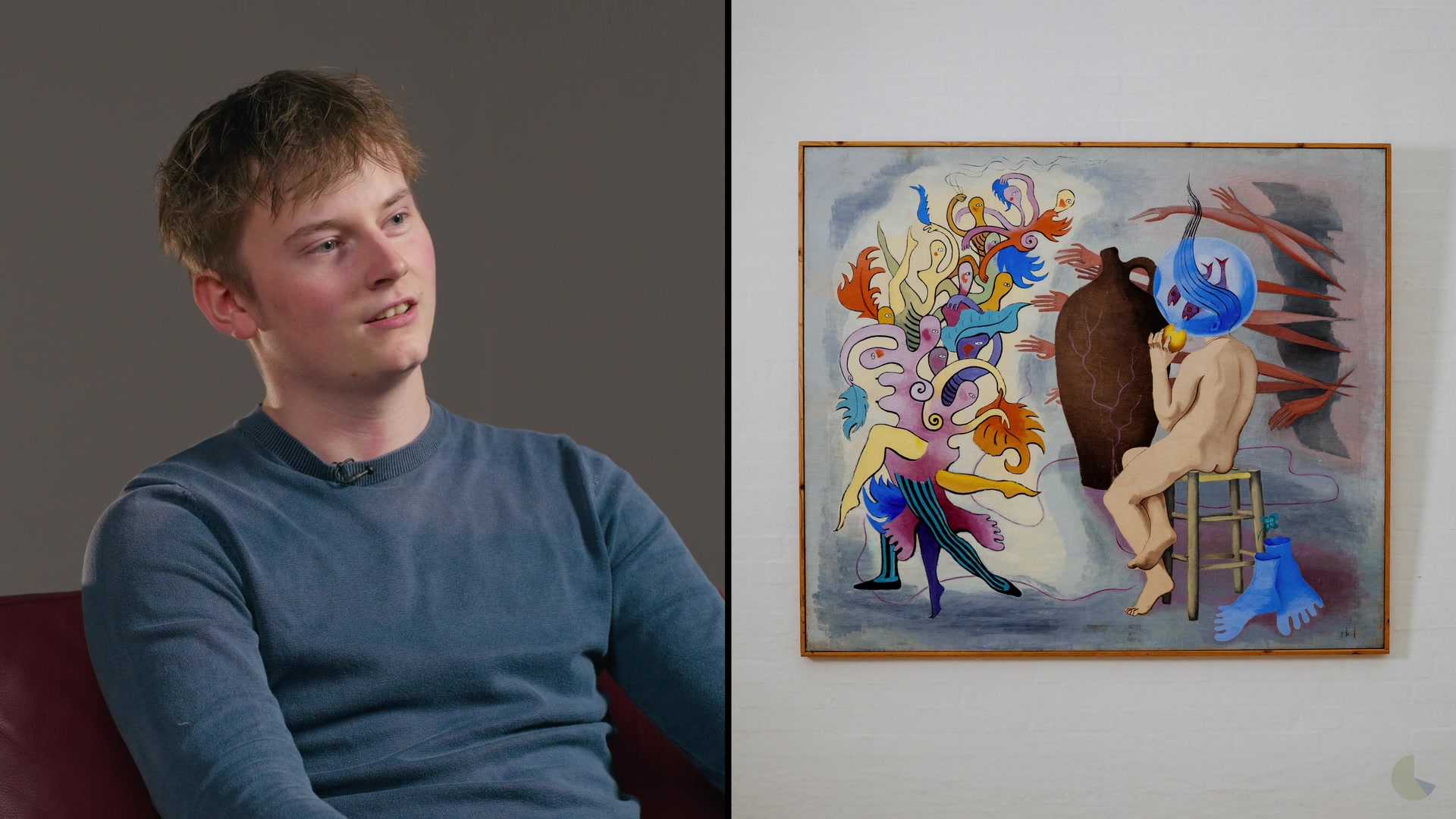 A young participant next to a surrealist painting
