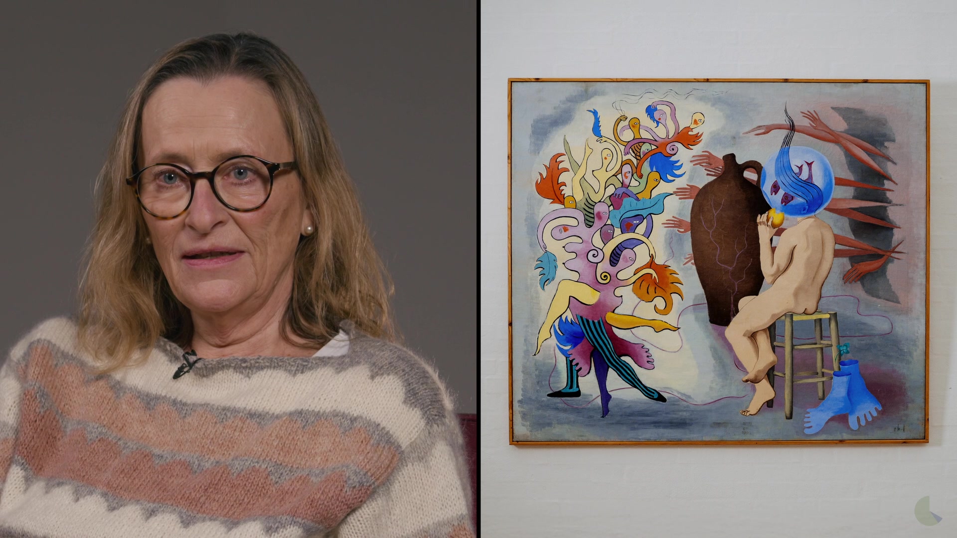A participant next to a surrealist painting