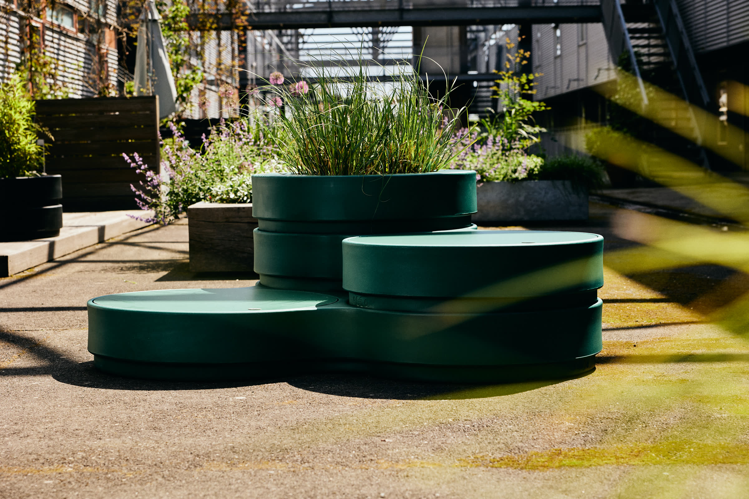 Green Circus modules with plants on a deck