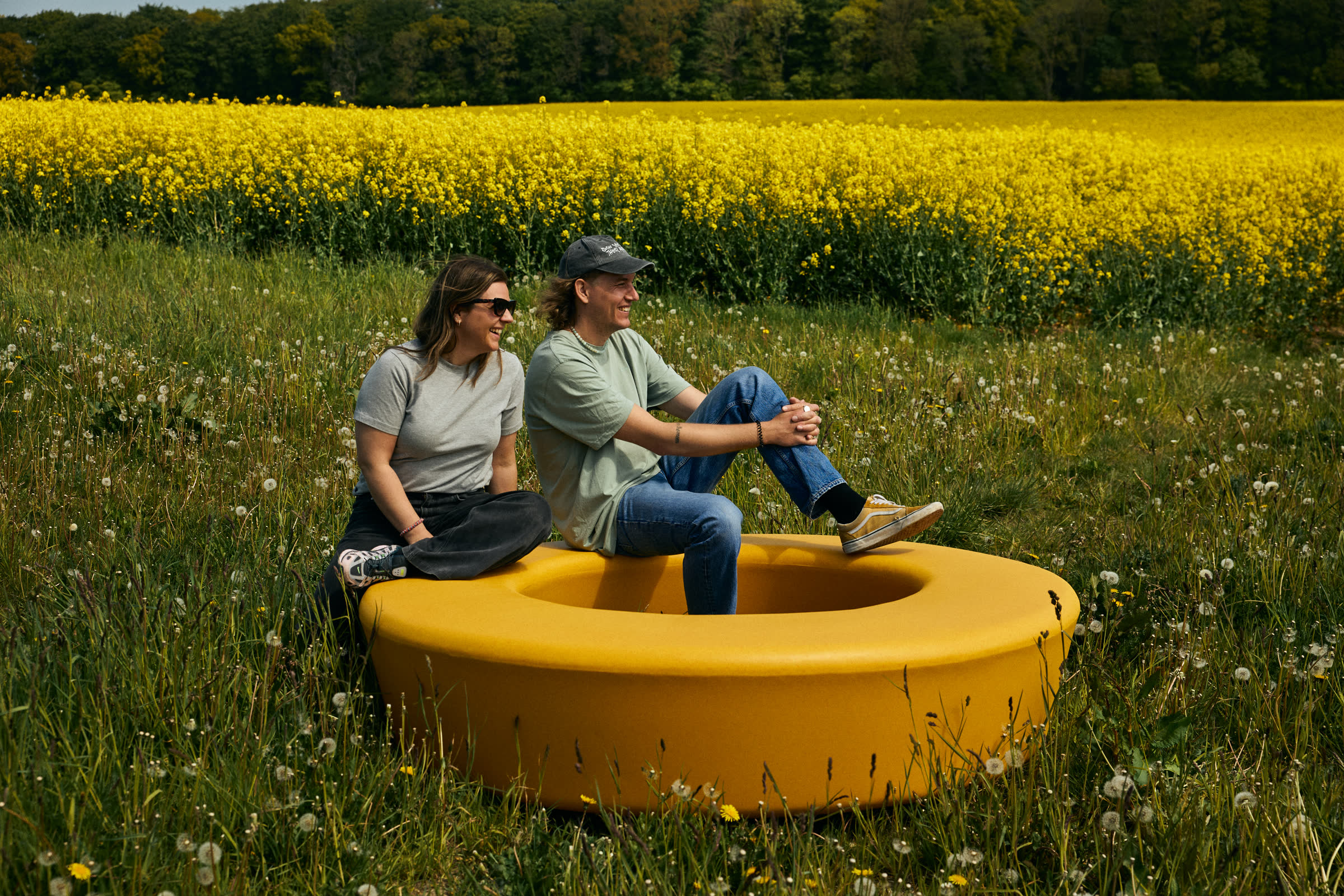 A yellow LOOP ring in a field