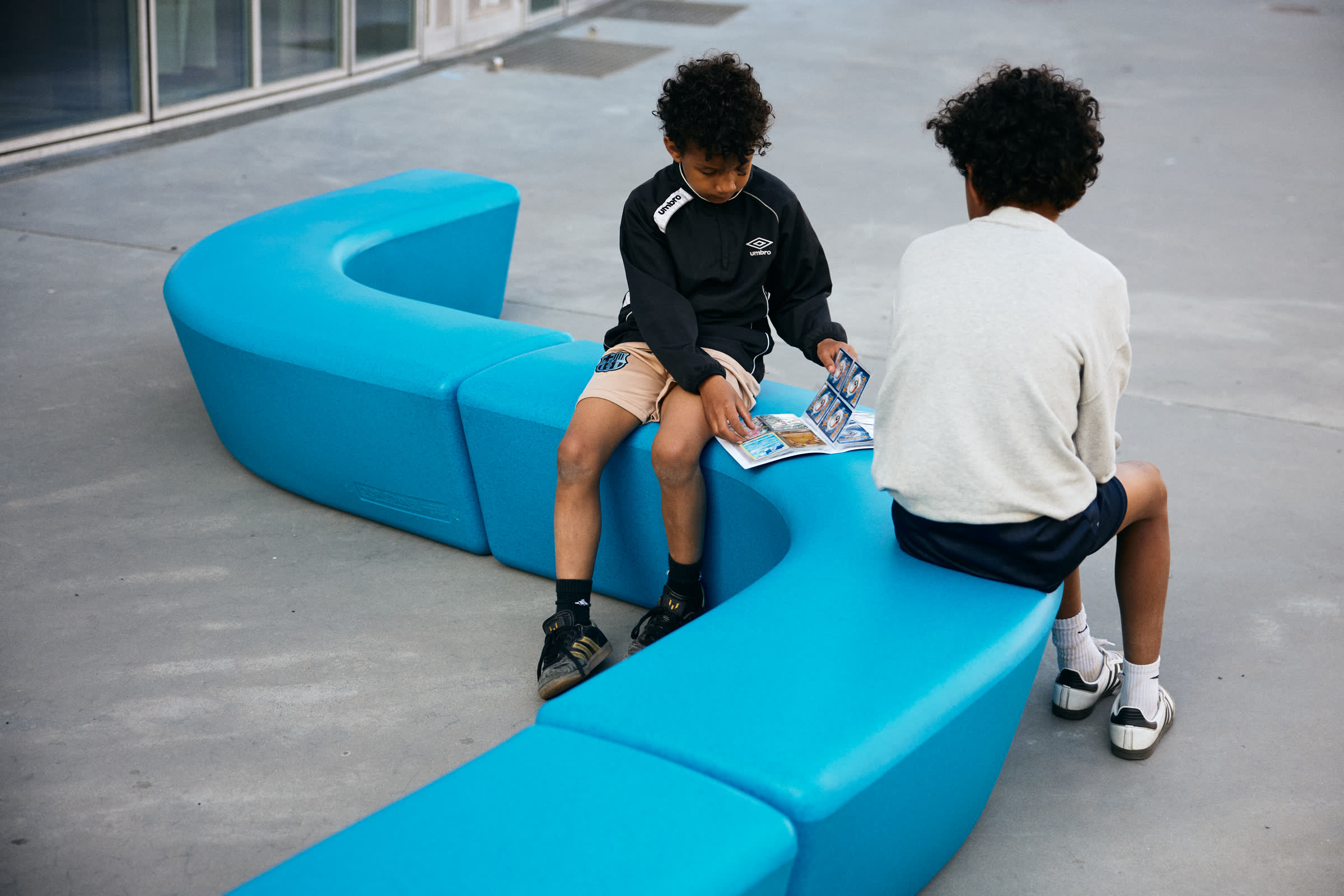 Two boys on blue LOOP modules