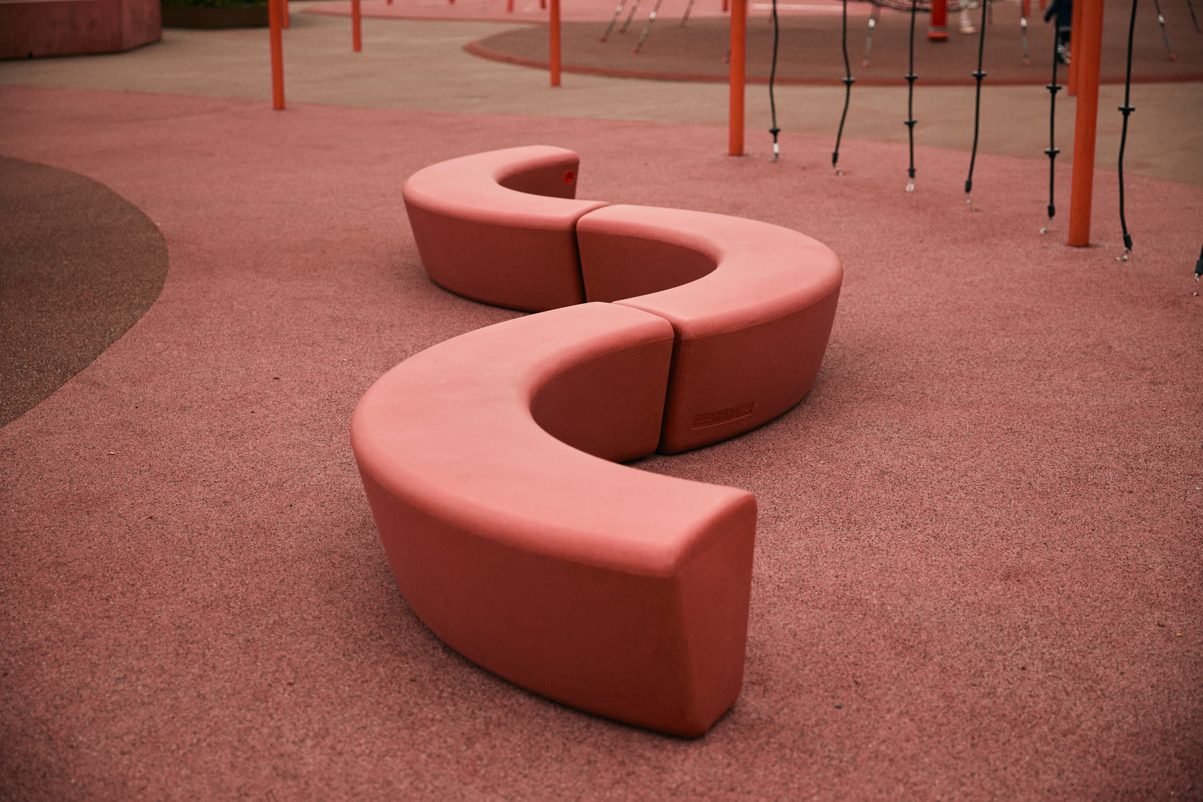 A red LOOP wave on a playground