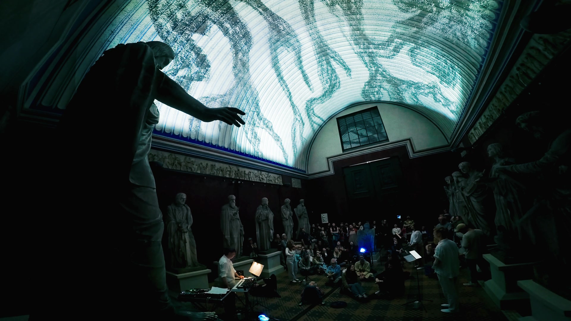 The Christ Hall with the projection on the vault and the audience below